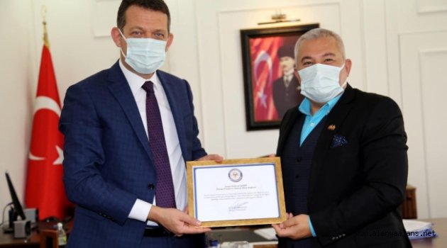 Kaymakam Ürkmezer’den Şahin’e teşekkür belgesi