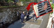 Alanya’da mazgala sıkışan yavru kedi kurtarıldı