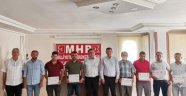 Alanya MHP’de mahalle başkanları belgelerini aldı
