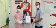 MHP’li Uygur’a Kızılay’dan madalya