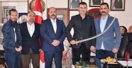 Mustafa Türkdoğan kılıcı kuşandı