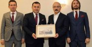 Yücel'den Bakan Elvan'a ziyaret